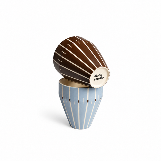 Brown and dusty blue Linework ceramic tumblers by abcd studio, hand-painted vertical line pattern