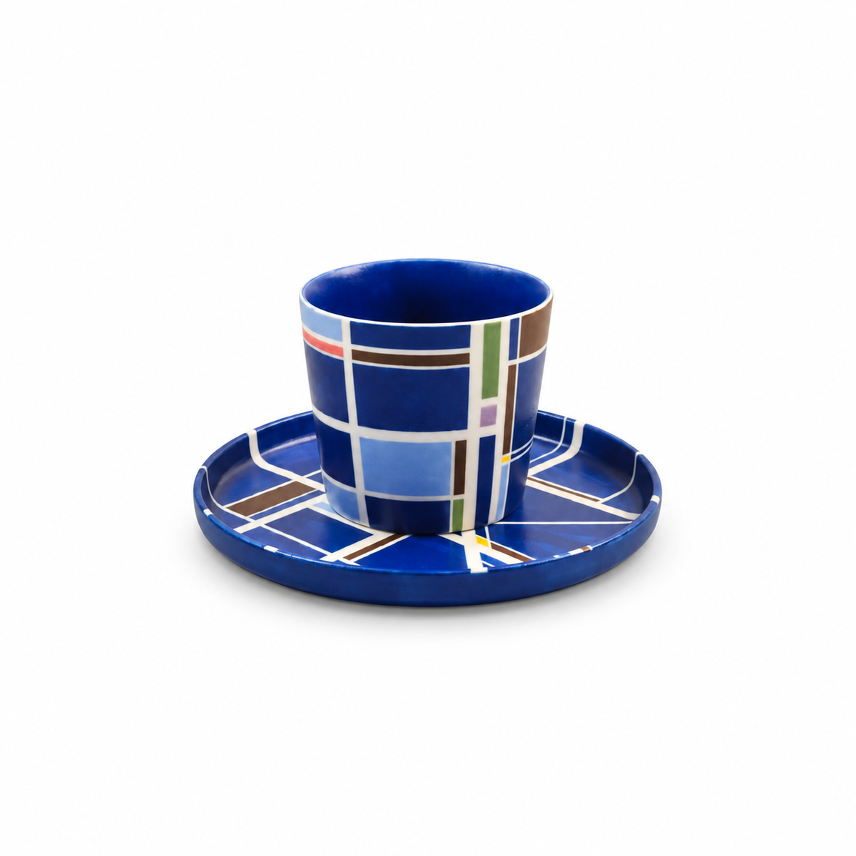 Cobalt blue Linework ceramic cup and saucer set with multicolor geometric blocks, abcd studio
