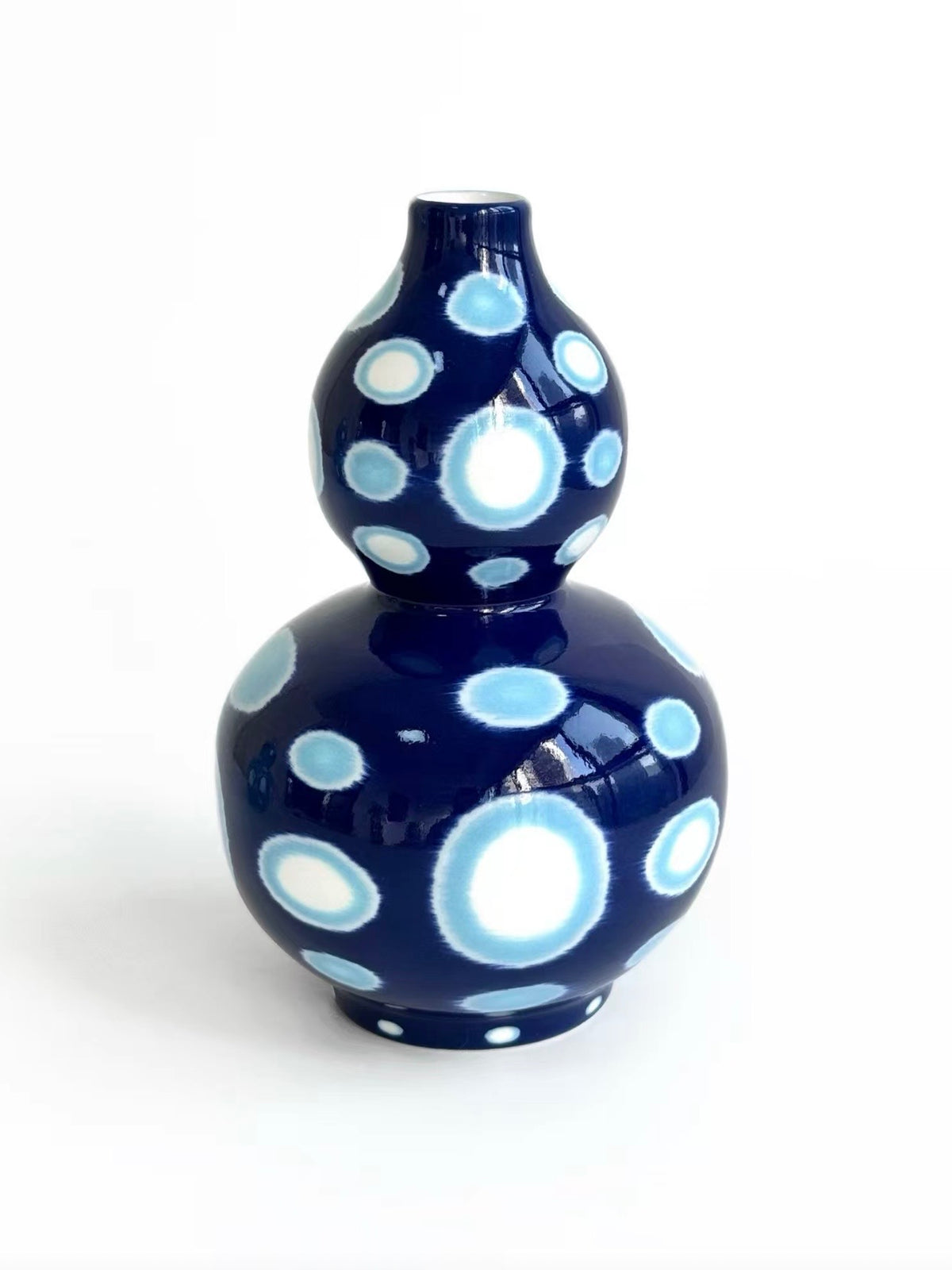 Navy blue double-gourd shaped ceramic vase with white polka dot pattern, TalkFun collection